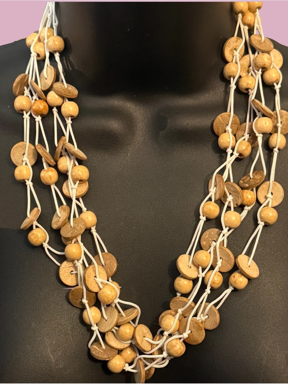 Multi strand coconut shell and wooden bead necklace
